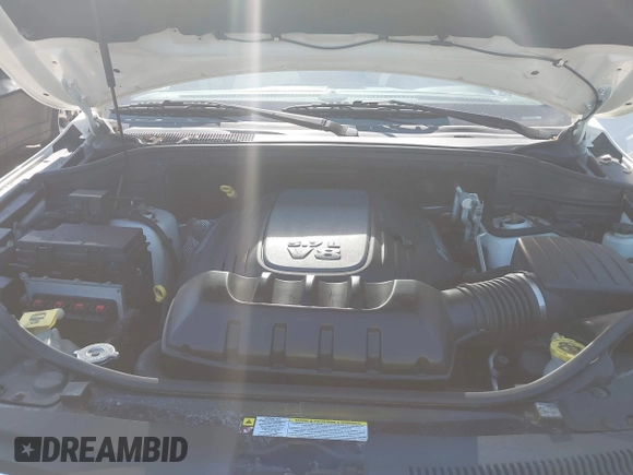 2011 Jeep Grand Cherokee Overland Summit with VIN 1J4RR6GT9BC546825, listed as a IAAI auction lot 42118789 with 123,449 mi miles. Bid and sale history available at carsss.com. Image 10.