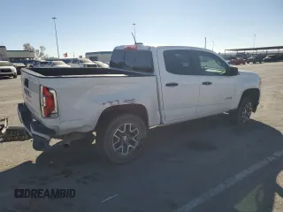 2022 GMC Canyon 4WD AT4 w/Leather with VIN 1GTG6FEN2N1200285, listed as a Copart auction lot 44564205 with 118,711 mi miles and Salvage Title. Bid and sale history available at carsss.com. Image 3.