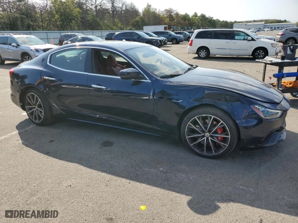 2022 Maserati Ghibli Modena Q4 with VIN ZAM57YTM7N1388954, listed as a Copart auction lot 70619264 with 24,909 mi miles and Salvage Title. Bid and sale history available at carsss.com. Image 4.