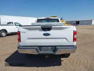 2019 Ford F-150 XL with VIN 1FTMF1EB1KKF02684, listed as a IAAI auction lot 42320140 with 185,189 mi miles and . Bid and sale history available at DreamBid. Image 16.
