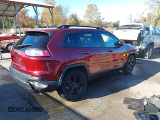 2021 Jeep Cherokee Altitude with VIN 1C4PJMLB1MD178417, listed as a IAAI auction lot 40769358 with 111,542 mi miles. Bid and sale history available at carsss.com. Image 4.