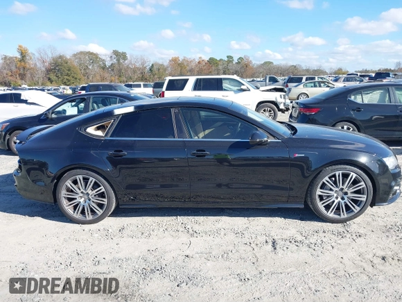 2013 Audi A7 3.0 Prestige with VIN WAU2GAFC2DN065112, listed as a IAAI auction lot 41117426 with 159,105 mi miles. Bid and sale history available at carsss.com. Image 14.