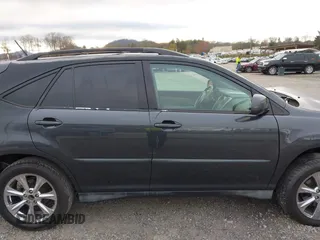 2005 Lexus RX with VIN 2T2GA31U65C040798, listed as a IAAI auction lot 41906233 with 211,026 mi miles. Bid and sale history available at carsss.com. Image 14.