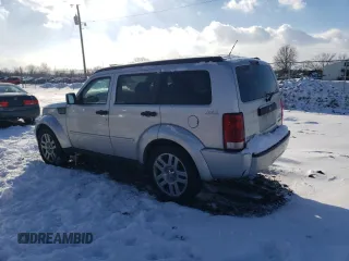 2010 Dodge Nitro Heat with VIN 1D4PU4GK5AW175296, listed as a Copart auction lot 87819235 with 168,542 mi miles and Clean title. Bid and sale history available at DreamBid. Image 2.