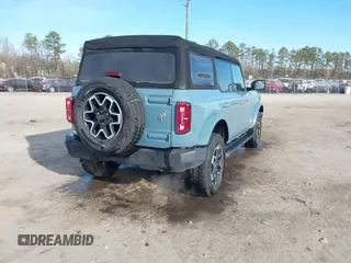 2022 Ford Bronco z VIN 1FMDE5DH0NLB77892, wystawiony jako IAAI lot #41466172 z przebiegiem 38 709 mil mil oraz . Historia ofert i sprzedaży dostępna na DreamBid. Obrazek 4.