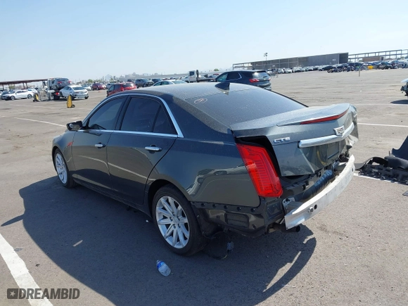 2016 Cadillac CTS Sedan RWD with VIN 1G6AP5SX8G0106667, listed as a IAAI auction lot 39978567 with 96,773 mi miles. Bid and sale history available at carsss.com. Image 3.