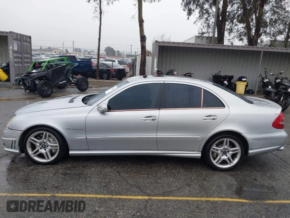 2003 Mercedes-Benz E-Class 5.5L AMG with VIN WDBUF76J93A351317, listed as a IAAI auction lot 41573446 with 144,119 mi miles. Bid and sale history available at carsss.com. Image 14.