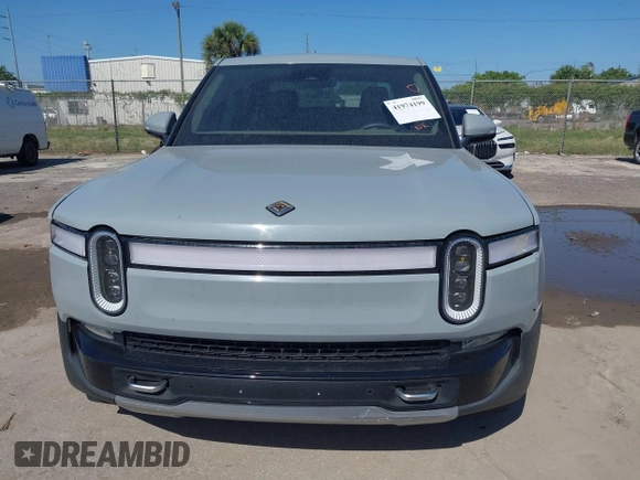 2022 Rivian R1T Adventure z VIN 7FCTGAAA2NN006053, wystawiony jako IAAI lot #41974199 z przebiegiem 286 mil mil oraz . Historia ofert i sprzedaży dostępna na DreamBid. Obrazek 6.