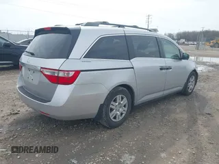 2013 Honda Odyssey LX with VIN 5FNRL5H22DB086503, listed as a IAAI auction lot 42133471 with 223,200 mi miles and . Bid and sale history available at carsss.com. Image 4.