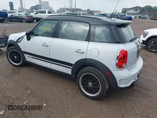2014 MINI Countryman S z VIN WMWZC5C5XEWP37470, wystawiony jako IAAI lot #42396984 z przebiegiem 77 847 mil mil oraz . Historia ofert i sprzedaży dostępna na DreamBid. Obrazek 3.
