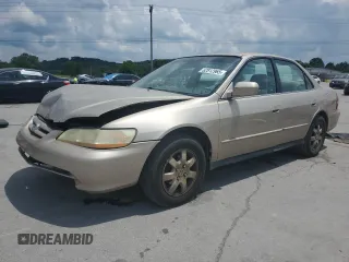 2002 Honda Accord LX with VIN 3HGCG56442G705013, listed as a Copart auction lot 62812965 with 328,041 mi miles and Salvage title. Bid and sale history available at DreamBid. Image 1.