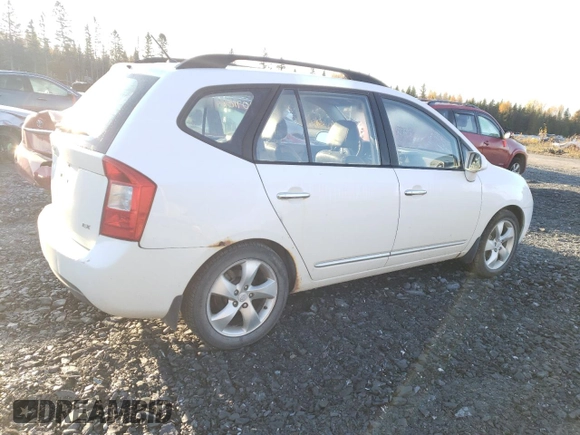 2009 Kia Rondo LX Base with VIN KNAFG528597268730, listed as a Copart auction lot 77071064 with 151,159 mi miles and Salvage Title. Bid and sale history available at carsss.com. Image 3.