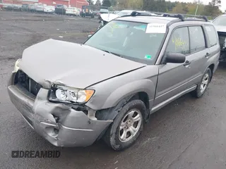 2006 Subaru Forester 2.5 X with VIN JF1SG63696H711784, listed as a IAAI auction lot 41966417 with 217,219 mi miles. Bid and sale history available at carsss.com. Image 2.