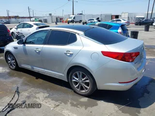 2013 Kia Optima EX with VIN 5XXGN4A75DG139872, listed as a IAAI auction lot 42483921 with 120,167 mi miles and . Bid and sale history available at DreamBid. Image 3.