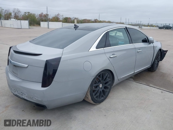 2013 Cadillac XTS Luxury with VIN 2G61P5S38D9213426, listed as a IAAI auction lot 41098261 with Not Provided miles. Bid and sale history available at carsss.com. Image 4.