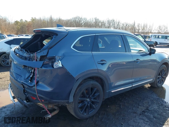 2021 Mazda CX-9 Grand Touring with VIN JM3TCBDY5M0506632, listed as a IAAI auction lot 41589264 with 50,026 mi miles and . Bid and sale history available at carsss.com. Image 17.