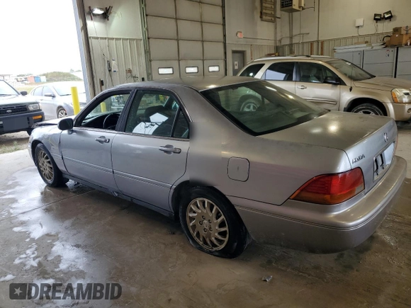 1998 Acura RL Premium with VIN JH4KA965XWC012742, listed as a Copart auction lot 73298574 with 0 mi miles and Salvage Title. Bid and sale history available at carsss.com. Image 2.