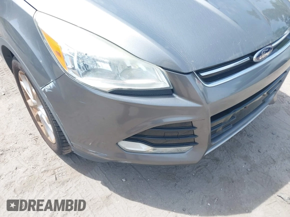 2014 Ford Escape Titanium with VIN 1FMCU0JX9EUE35382, listed as a IAAI auction lot 42085453 with 162,701 mi miles. Bid and sale history available at carsss.com. Image 6.