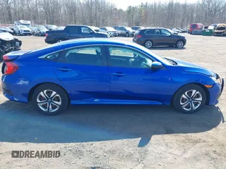 2017 Honda Civic LX z VIN 19XFC2F54HE203525, wystawiony jako IAAI lot #41796081 z przebiegiem 82 910 mil mil oraz . Historia ofert i sprzedaży dostępna na DreamBid. Obrazek 13.