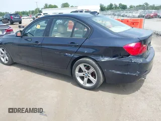 2014 BMW 3 Series 328i xDrive with VIN WBA3B5G51ENS11317, listed as a IAAI auction lot 42494223 with 171,528 mi miles and . Bid and sale history available at DreamBid. Image 6.