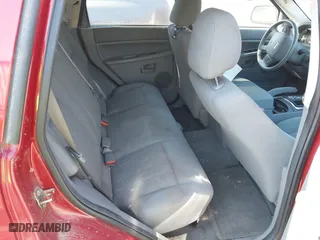 2006 Jeep Grand Cherokee Laredo with VIN 1J4GS48K76C263223, listed as a IAAI auction lot 41726919 with 934,888 mi miles. Bid and sale history available at carsss.com. Image 8.