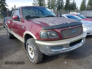 1997 Ford F-150 z VIN 1FTDX0869VKA35573, wystawiony jako IAAI lot #41547268 z przebiegiem 159 096 mil mil oraz . Historia ofert i sprzedaży dostępna na DreamBid. Obrazek 1.