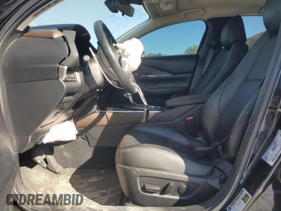 2020 Mazda CX-30 Premium with VIN 3MVDMAEM4LM137806, listed as a Copart auction lot 76620304 with 65,071 mi miles and Salvage title. Bid and sale history available at DreamBid. Image 7.
