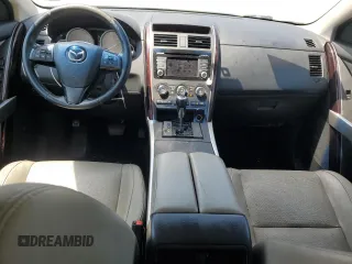 2015 Mazda CX-9 Grand Touring z VIN JM3TB2DA3F0452160, wystawiony jako Copart lot #60220655 z przebiegiem 145 185 mil mil oraz Szkoda całkowita • Salvage title. Historia ofert i sprzedaży dostępna na DreamBid. Obrazek 8.