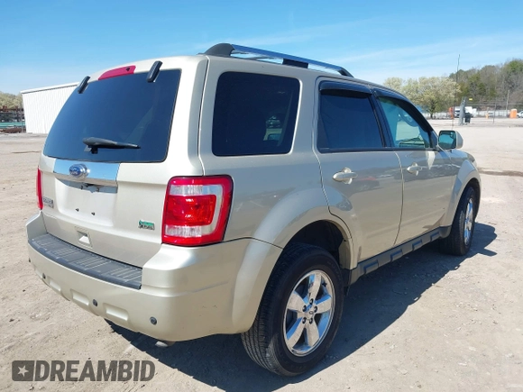 2011 Ford Escape Limited with VIN 1FMCU9EG7BKA25766, listed as a IAAI auction lot 41810992 with 74,226 mi miles. Bid and sale history available at carsss.com. Image 4.