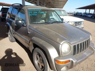 2003 Jeep Liberty Limited with VIN 1J4GL58K53W723573, listed as a IAAI auction lot 40490439 with 1 mi miles. Bid and sale history available at carsss.com. Image 1.