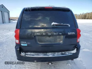 2014 Dodge Grand Caravan SE 30th Anniversary with VIN 2C4RDGBG9ER467543, listed as a Copart auction lot 87100594 with 393,038 mi miles and Clean Title. Bid and sale history available at DreamBid. Image 6.
