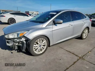 2017 Ford Focus Titanium with VIN 1FADP3J28HL279910, listed as a Copart auction lot 62967675 with 133,651 mi miles and Clean title. Bid and sale history available at DreamBid. Image 1.