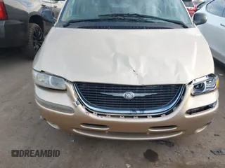 1999 Chrysler Town & Country LXi with VIN 1C4GP54L8XB612991, listed as a IAAI auction lot 41669165 with 199,327 mi miles and . Bid and sale history available at DreamBid. Image 6.