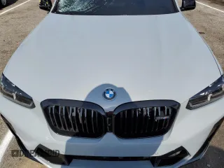 2023 BMW X4 M with VIN 5YM23EC08P9S82734, listed as a Copart auction lot 53445774 with 0 mi miles and Salvage Title. Bid and sale history available at carsss.com. Image 11.