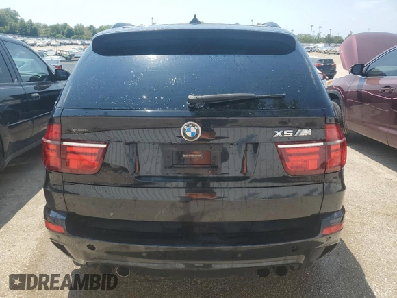 2011 BMW X5 M with VIN 5YMGY0C55BLK27157, listed as a Copart auction lot 65929154 with 0 mi miles and Salvage Title. Bid and sale history available at carsss.com. Image 6.