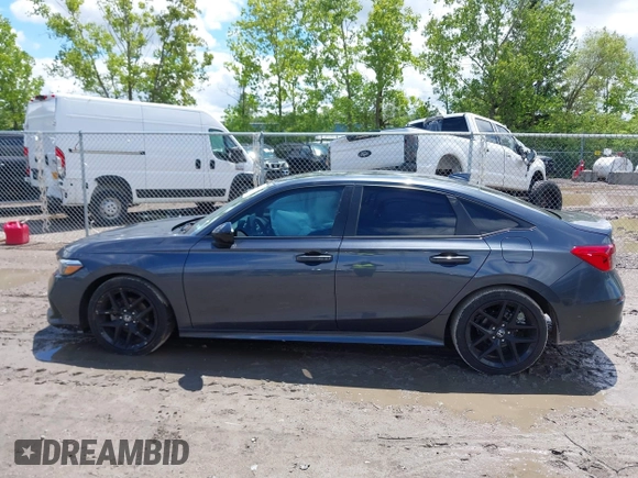 2022 Honda Civic Sport z VIN 2HGFE2F58NH560511, wystawiony jako IAAI lot #42346044 z przebiegiem 51 357 mil mil oraz . Historia ofert i sprzedaży dostępna na DreamBid. Obrazek 15.