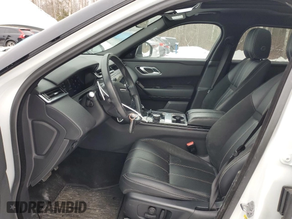 2020 Land Rover Range Rover Velar z VIN SALYK2FX9LA284099, wystawiony jako Copart lot #41687225 z przebiegiem 92 330 mil mil oraz Czysty tytuł • Clean title. Historia ofert i sprzedaży dostępna na DreamBid. Obrazek 7.