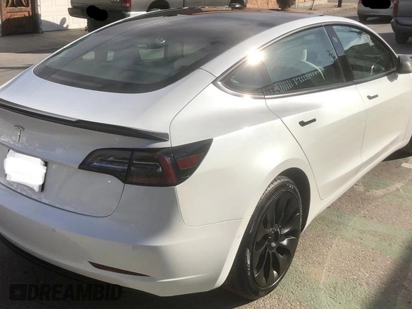 2021 Tesla Model 3 Standard Range Plus with VIN 5YJ3E1EA2MF854372, listed as a Copart auction lot 56435825 with 44,637 mi miles and Salvage Title. Bid and sale history available at DreamBid. Image 4.