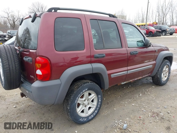 2002 Jeep Liberty Sport with VIN 1J4GL48K12W270609, listed as a IAAI auction lot 42062257 with 120,667 mi miles. Bid and sale history available at carsss.com. Image 4.