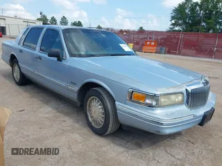 1997 Lincoln Town Car Signature with VIN 1LNLM82W4VY603913, listed as a IAAI auction lot 42554051 with Not provided miles and . Bid and sale history available at DreamBid. Image 1.