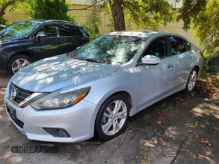 2016 Nissan Altima SL with VIN 1N4BL3AP8GC158954, listed as a IAAI auction lot 42718057 with 185,205 mi miles and . Bid and sale history available at DreamBid. Image 2.