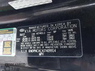 2018 Kia Sportage EX with VIN KNDPNCAC4J7409914, listed as a IAAI auction lot 41654833 with 142,057 mi miles and . Bid and sale history available at carsss.com. Image 9.