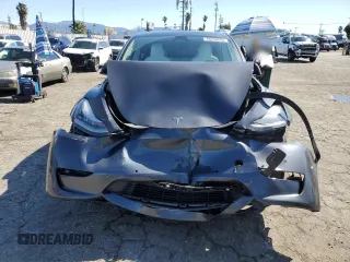 2022 Tesla Model Y Long Range with VIN 7SAYGDEE1NF391553, listed as a Copart auction lot 48259445 with Not Provided miles and Salvage Title. Bid and sale history available at carsss.com. Image 5.