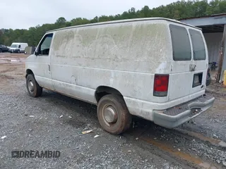 2002 Ford Econoline Cargo with VIN 1FTNE24L42HB67991, listed as a IAAI auction lot 40816497 with 310,862 mi miles. Bid and sale history available at carsss.com. Image 3.