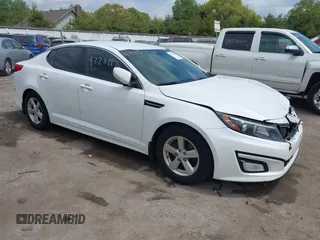 2015 Kia Optima LX z VIN KNAGM4A70F5649084, wystawiony jako IAAI lot #42231976 z przebiegiem 152 545 mil mil oraz . Historia ofert i sprzedaży dostępna na DreamBid. Obrazek 1.
