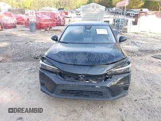 2022 Honda Civic LX z VIN 2HGFE2F21NH506473, wystawiony jako IAAI lot #42071786 z przebiegiem 41 136 mil mil oraz . Historia ofert i sprzedaży dostępna na DreamBid. Obrazek 12.