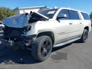 2015 Chevrolet Suburban LT z VIN 1GNSCJKC1FR608117, wystawiony jako IAAI lot #41641560 z przebiegiem 163 770 mil mil oraz . Historia ofert i sprzedaży dostępna na DreamBid. Obrazek 21.