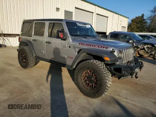 2020 Jeep Wrangler Unlimited Rubicon with VIN 1C4HJXFG6LW309146, listed as a Copart auction lot 88423285 with 65,288 mi miles and Salvage title. Bid and sale history available at DreamBid. Image 4.