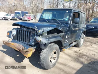 2003 Jeep Wrangler X with VIN 1J4FA39S53P362991, listed as a IAAI auction lot 41607212 with 240,556 mi miles. Bid and sale history available at carsss.com. Image 17.