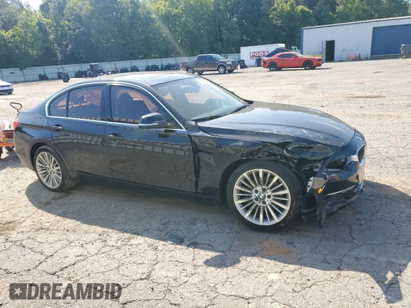 2012 BMW 3 Series 328i with VIN WBA3A5C58CF348710, listed as a Copart auction lot 61266815 with 112,720 mi miles and Salvage title. Bid and sale history available at DreamBid. Image 4.